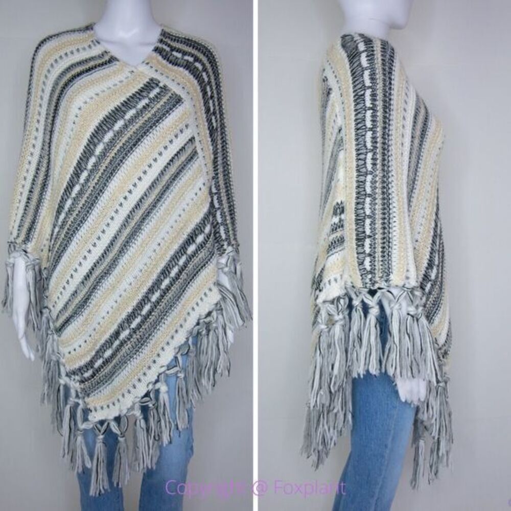 Akira slanted stripe poncho with fringe edge
